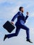 Success in business demands supernatural efforts from entrepreneur personality. Businessman with briefcase jump high