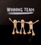 Success concept, Wooden Stick Figures team the word Winning Team on a chalkboard.