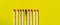 Success, defeat, achievement. The concept of happiness. Matches on a yellow background. Burnt dark match among normal matches.