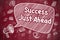 Success Just Ahead - Doodle Illustration on Red Chalkboard.