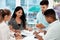 Success lies in the planning. a group of young business colleagues gathered around a table in their office.