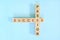 Success and passion business and career concept. Wooden block crossword puzzle flat lay in blue background.