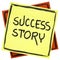 Success story text on sticky note