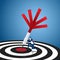 Success target concept. Businessman holding dart hitting the center success target.