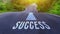 Success text written on road concept for business planning strategies and challenges or career path opportunities and change,