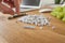 Success word written on cube shape white blocks on wooden Business table