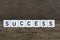 Success, written in cubes