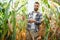 successful agriculturist in field of corn