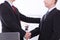 Successful business partnership concept. businessmans handshake at office background. Team work businessmen handshaking after deal