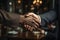 Successful business professionals shaking hands in agreement, formal business meeting image
