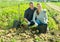 Successful farm family during potatoes harvest