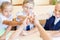 Successful group of children at school with thumb up gesture
