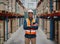 Successful manufacturing unit worker standing in warehouse distribution centre with folded hands with helmet and uniform