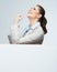 Successfull young business woman portrait out the blank white b