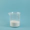 Succinic acid powder in measuring plastic cup