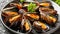Succulent grilled mussels on elegant black plate authentic mediterranean cuisine