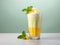 Succulent Mango Milkshake Fusion: A Treat with Fresh Mint and Mango Slices!