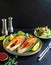 Succulent salmon steaks on a plate with salad.