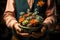 Succulents in a pot in the hands of a florist