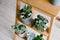 Succulents on a wooden shelf. Echeveria Doris Taylor and Aloe variegata