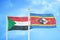 Sudan and Eswatini Swaziland two flags on flagpoles and blue sky