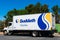 Suddath Relocation Systems truck waits for customer on outdoor parking lot.