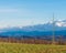 The Sudetes seen from a distance with the peaks partially covered with a layer of dense clouds.