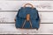 Suede backpack with leather handle