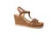 Suede women`s sandal with a high flat heel isolated on a white background