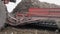 Sugar-beet harvesting. operation of loading the root in the back of a truck trailer.