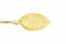 Sugar on brass spoon isolated on white background with clipping path