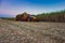 sugar cane field mechanical harvesting with a tractor carrying harvest