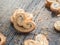 Sugar cookie curls with poppy seed puff pastry on wooden background. Confectionery for the recipe. Pastries, dessert