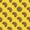 sugar cookie pattern on yellow background with one eye-catching object