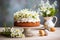 Sugar glazed Easter bread cake decorated with spring flowers on morning table with easter eggs.