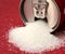 sugar pouring out from alluminium can, health concept