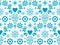 Sugar skull seamless pattern inspired by Mexican folk art, Dia de Los Muertos repetitive design in turquoise on white backg