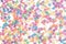 Sugar sprinkle dots hearts, decoration for cake and bakery, as a background