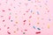 sugar sprinkles over pink background