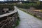 The suggestive and famous Ponte del Diavolo of Lucca built in bricks over a river in an ancient medieval village in Borgo a