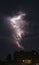 Suggestive picture of  powerful bolt of lightning on night sky