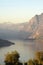 An suggestive view of Lake Iseo at sunset with the fog