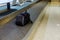 Suitcase in the airport international tourists traveling airport terminal waiting area, focus on suitcases
