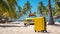 Suitcase on the beach near taxi car background. Yellow travel luggage on white tropical sand near sea ocean. Summer holidays.
