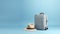 Suitcase and hat against a blue background. Travel concept. minimal style