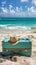 A suitcase, hat and sunglasses on the beach near a blue ocean, AI