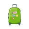 Suitcase for travel, luggage for airplane flight, plastic green valise with trolley, tags