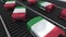 Suitcases featuring flag of Italy move on the conveyor in an airport. Italian tourism related loopable animation