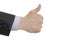 A suited man holding thumbs up on white background