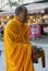 Sukhothai, Tahiland - 2019-03-06 - Monk Walks Asking for Alms